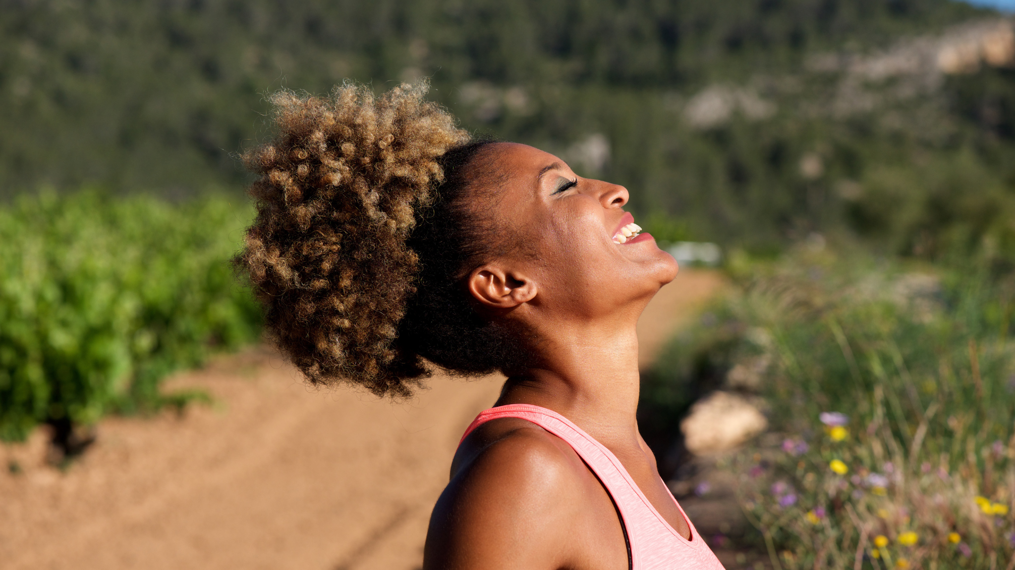 Happy Black woman smiling outdoors. A Simple Way to Practice Self-Love