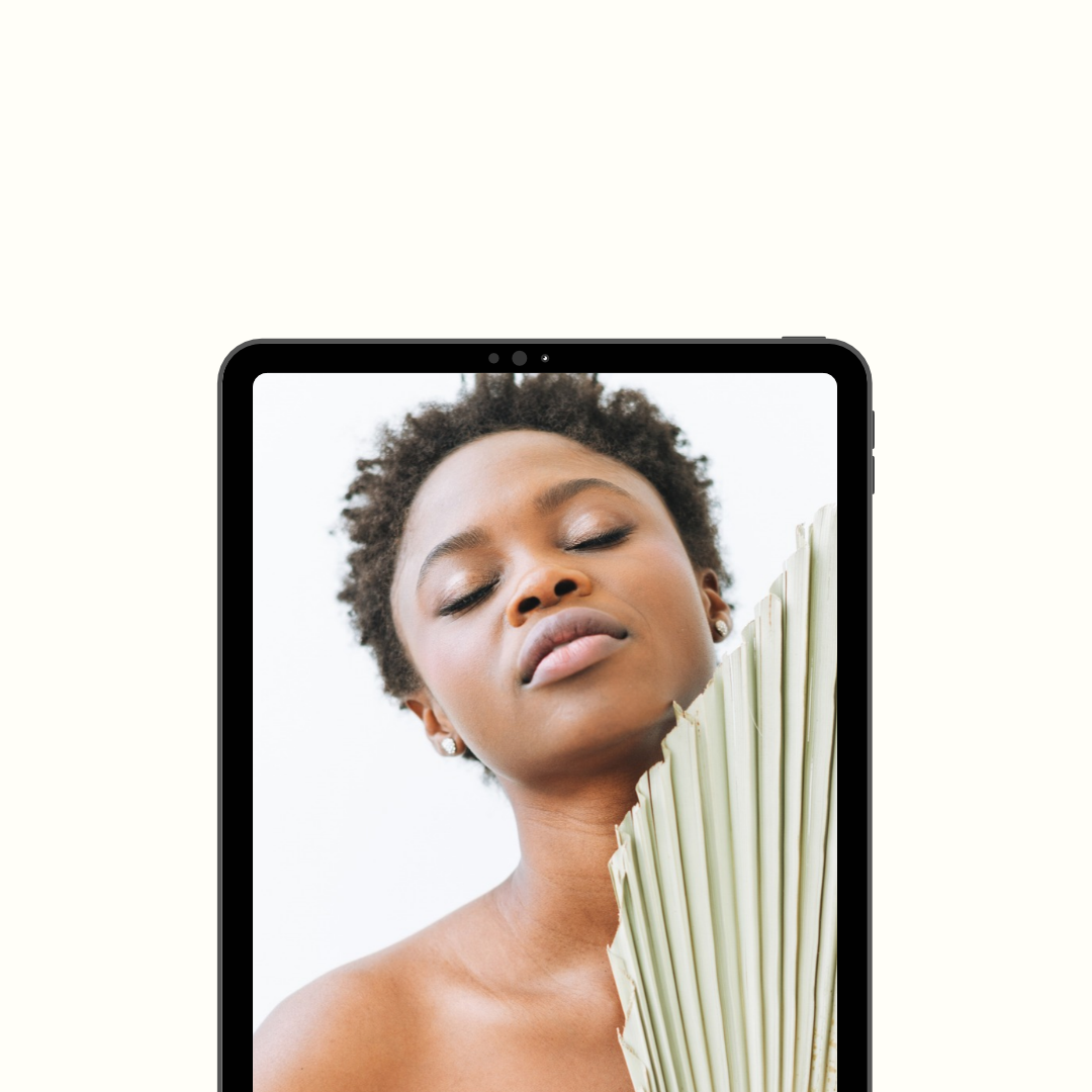 A black tablet device shown vertically on a plain white background, with a portrait of a woman displayed on its screen for Autumn Issue.
